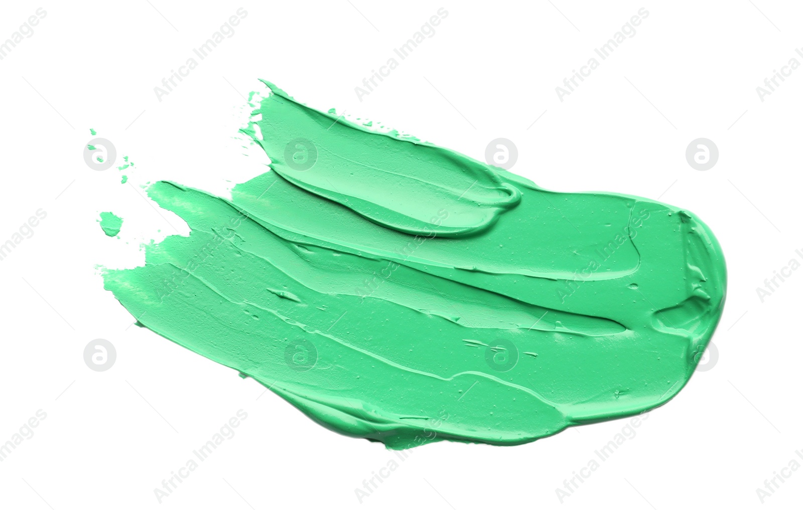 Photo of Green oil paint stroke on white background, top view