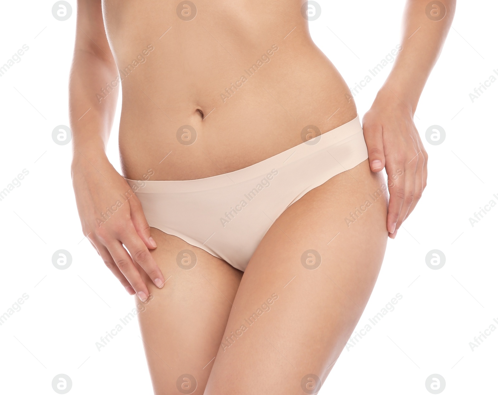 Photo of Young woman showing smooth skin after bikini epilation on white background