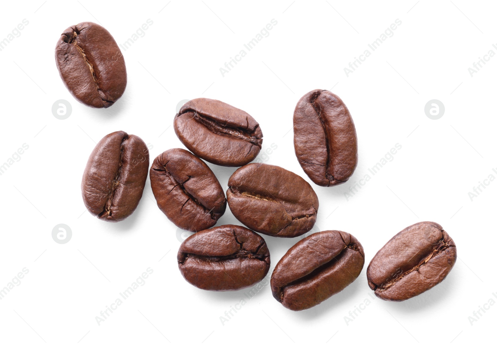 Photo of Many roasted coffee beans isolated on white, top view