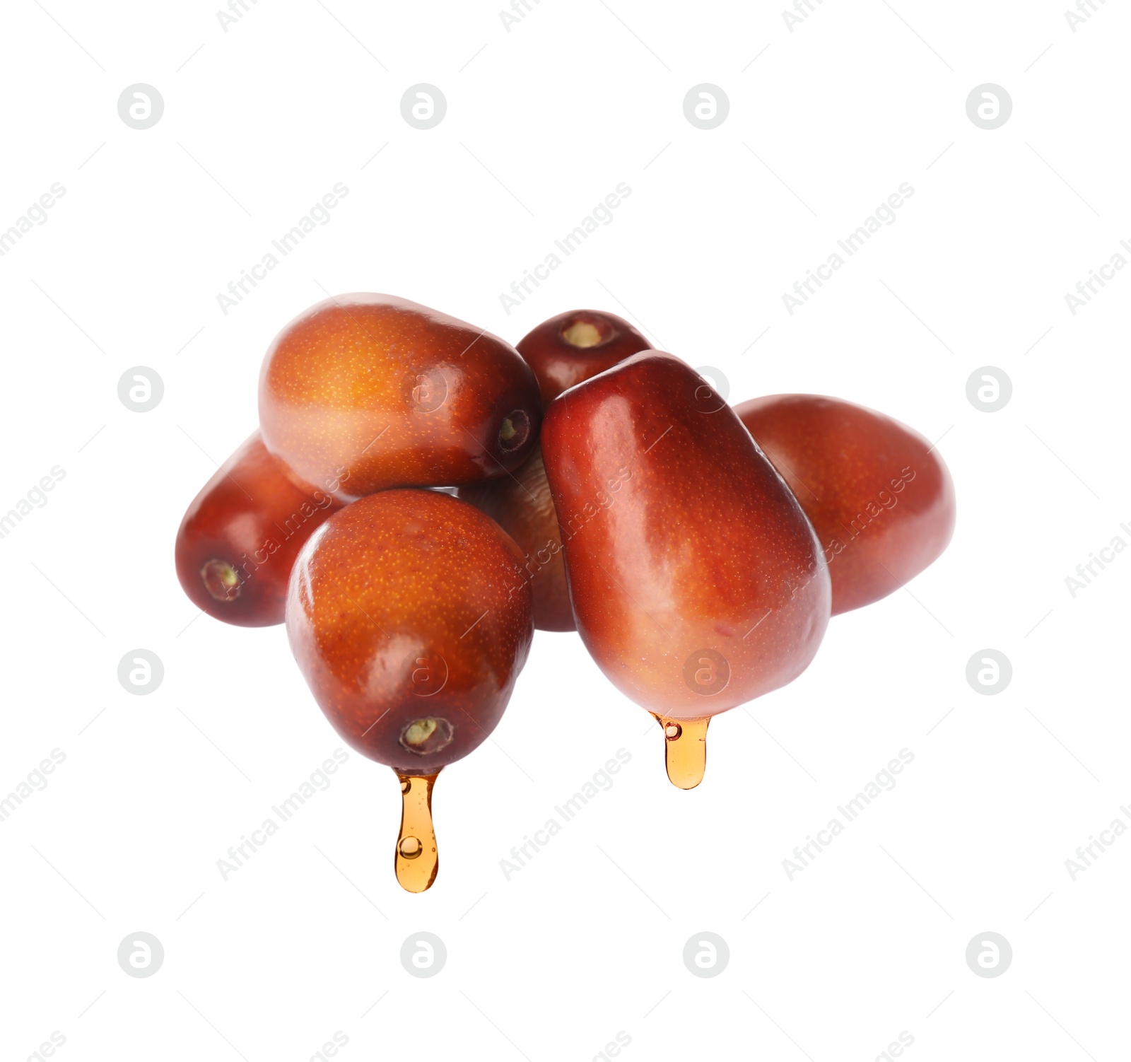 Image of Oil dripping from palm fruits on white background