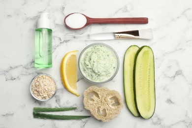 Photo of Flat lay composition with handmade face mask and ingredients on marble table