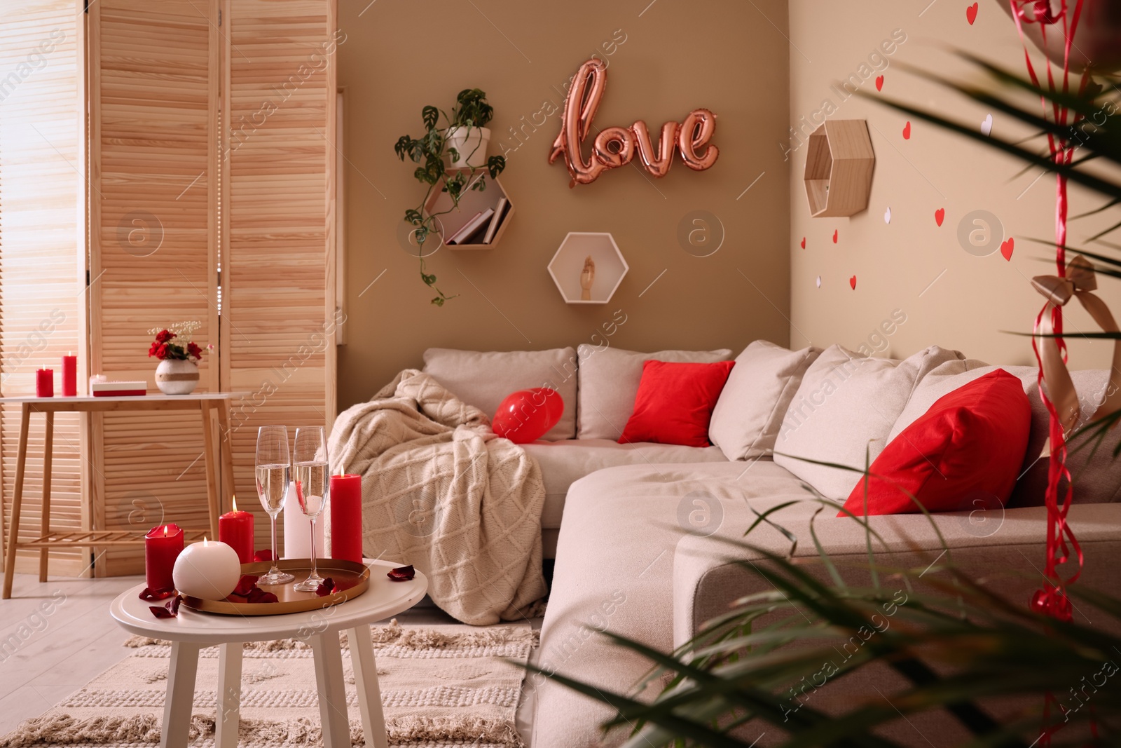 Photo of Cozy room decorated for Valentine's Day. Interior design