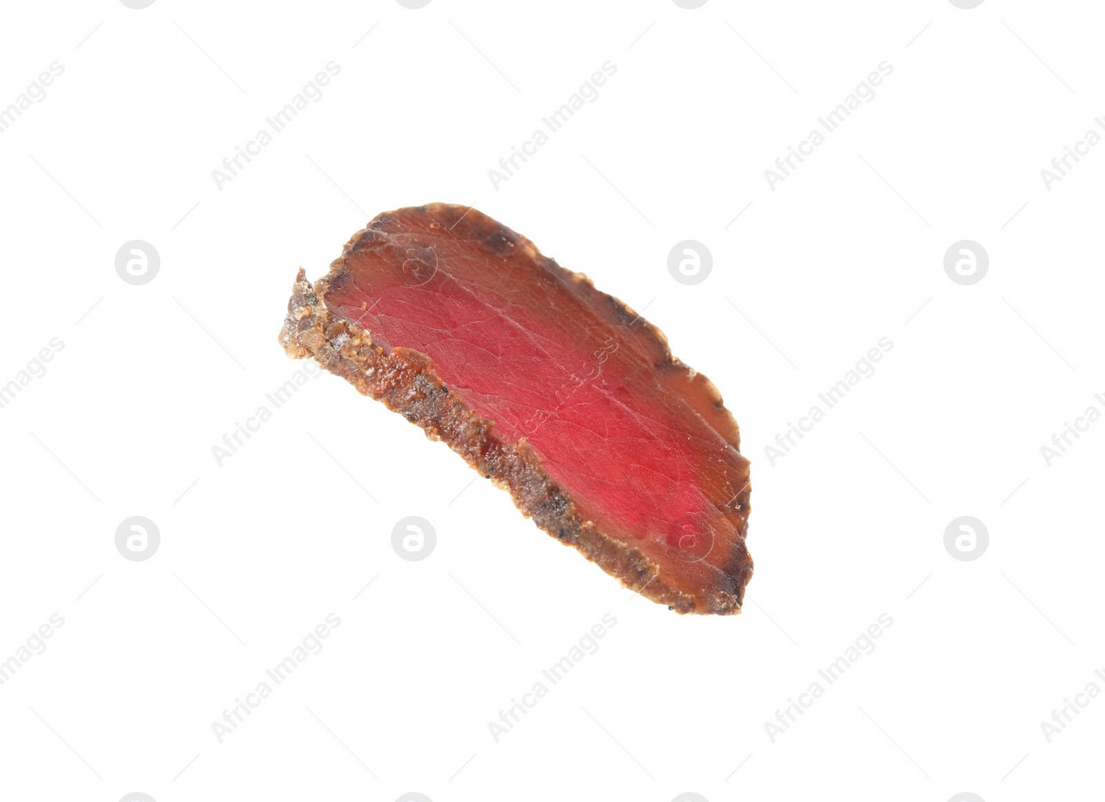 Photo of Delicious dry-cured beef basturma slice isolated on white