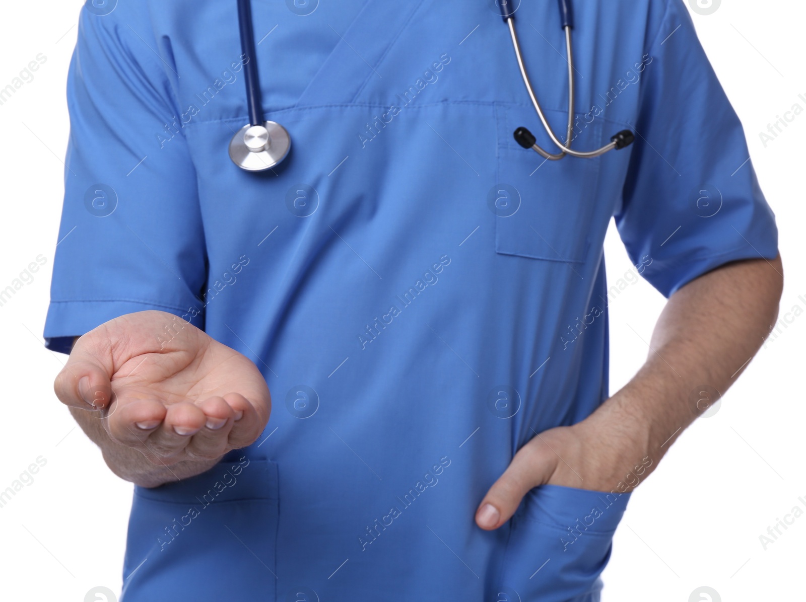 Photo of Doctor with stethoscope holding something on white background, closeup. Cardiology concept