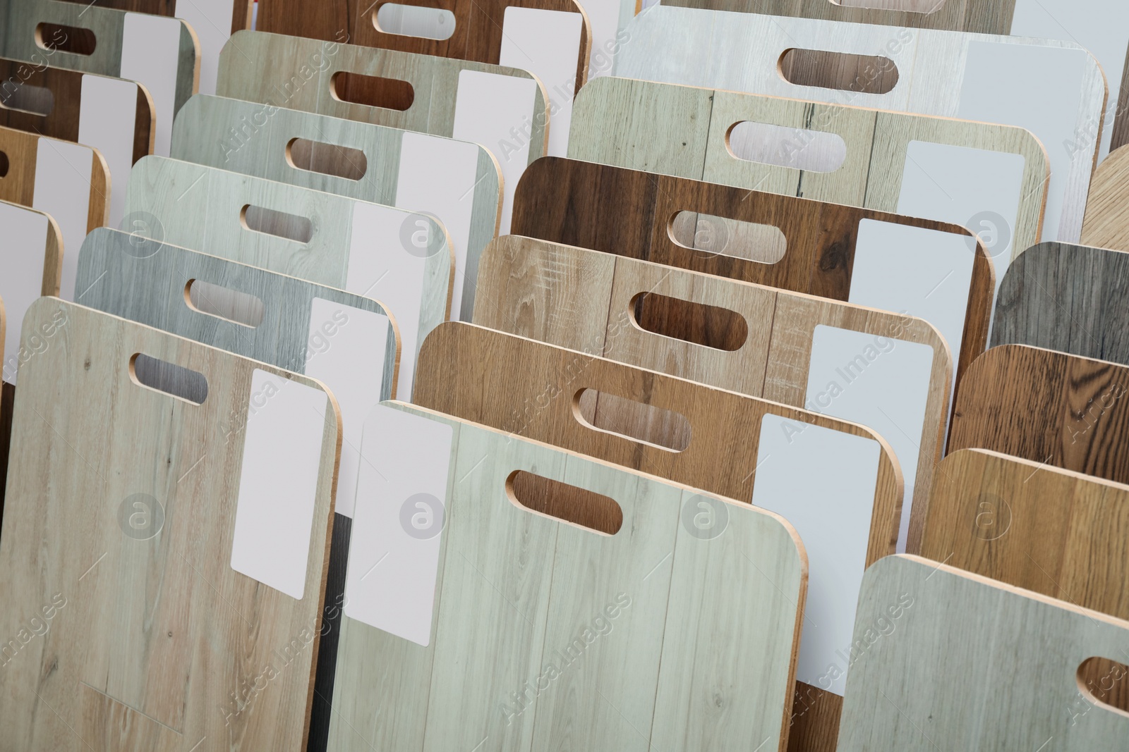 Photo of Many different samples of wooden flooring in store