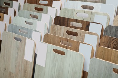 Photo of Many different samples of wooden flooring in store