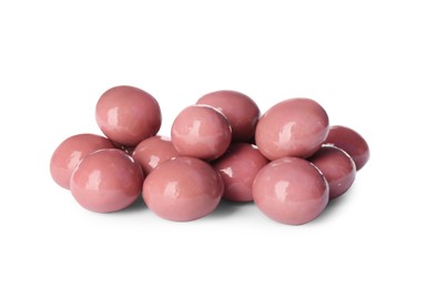 Delicious pink chocolate candies on white background