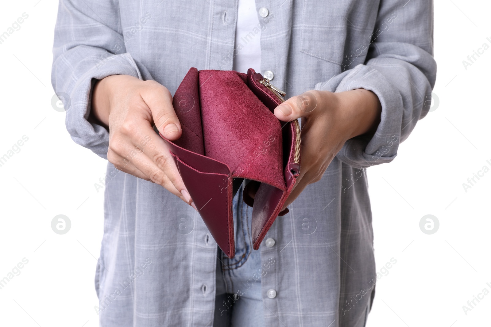 Photo of Poor woman with empty wallet on white background, closeup