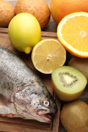 Photo of Allergenic food. Different fresh products on wooden table, closeup