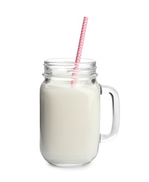 Photo of Mason jar with milk on white background