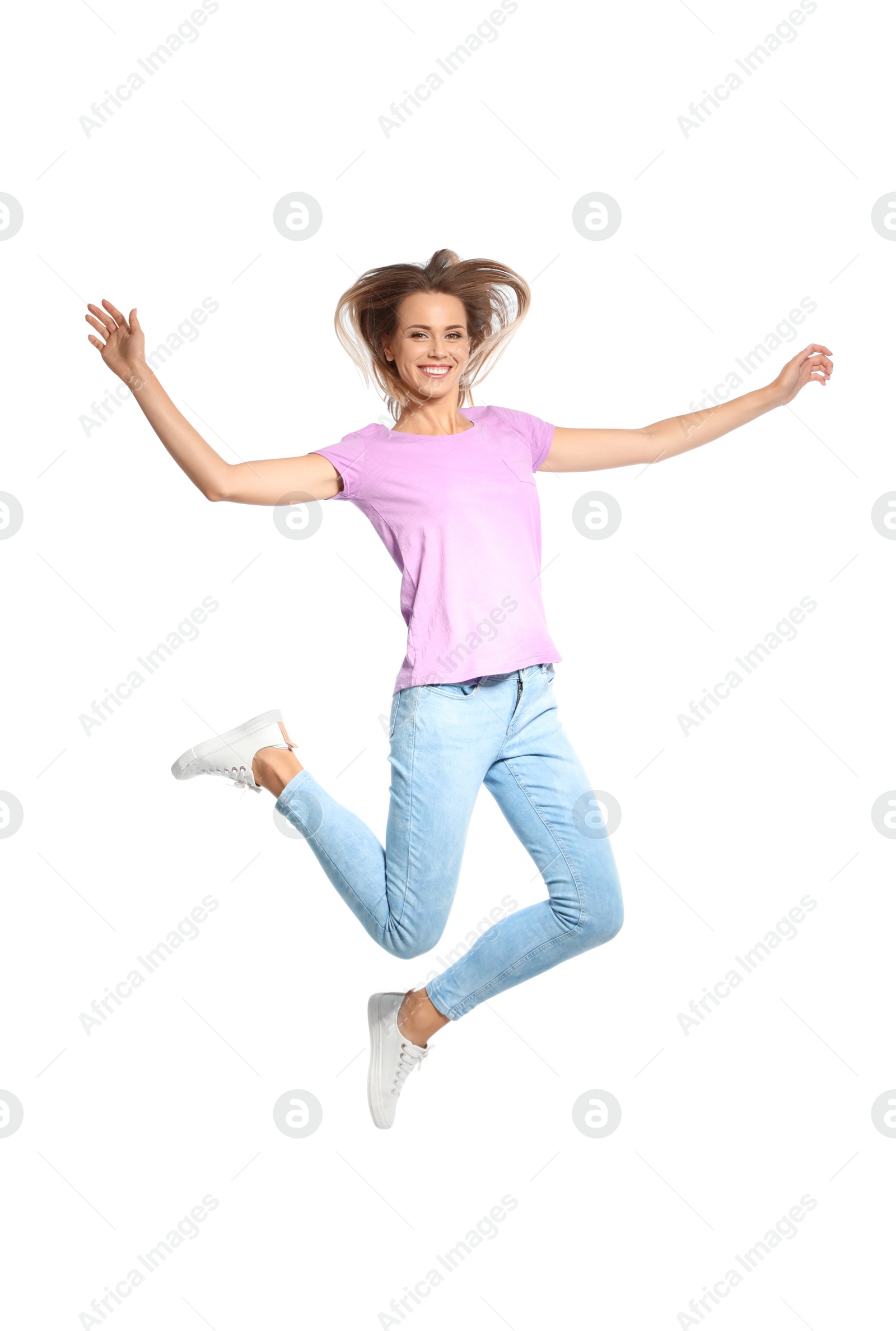 Photo of Beautiful woman jumping on white background