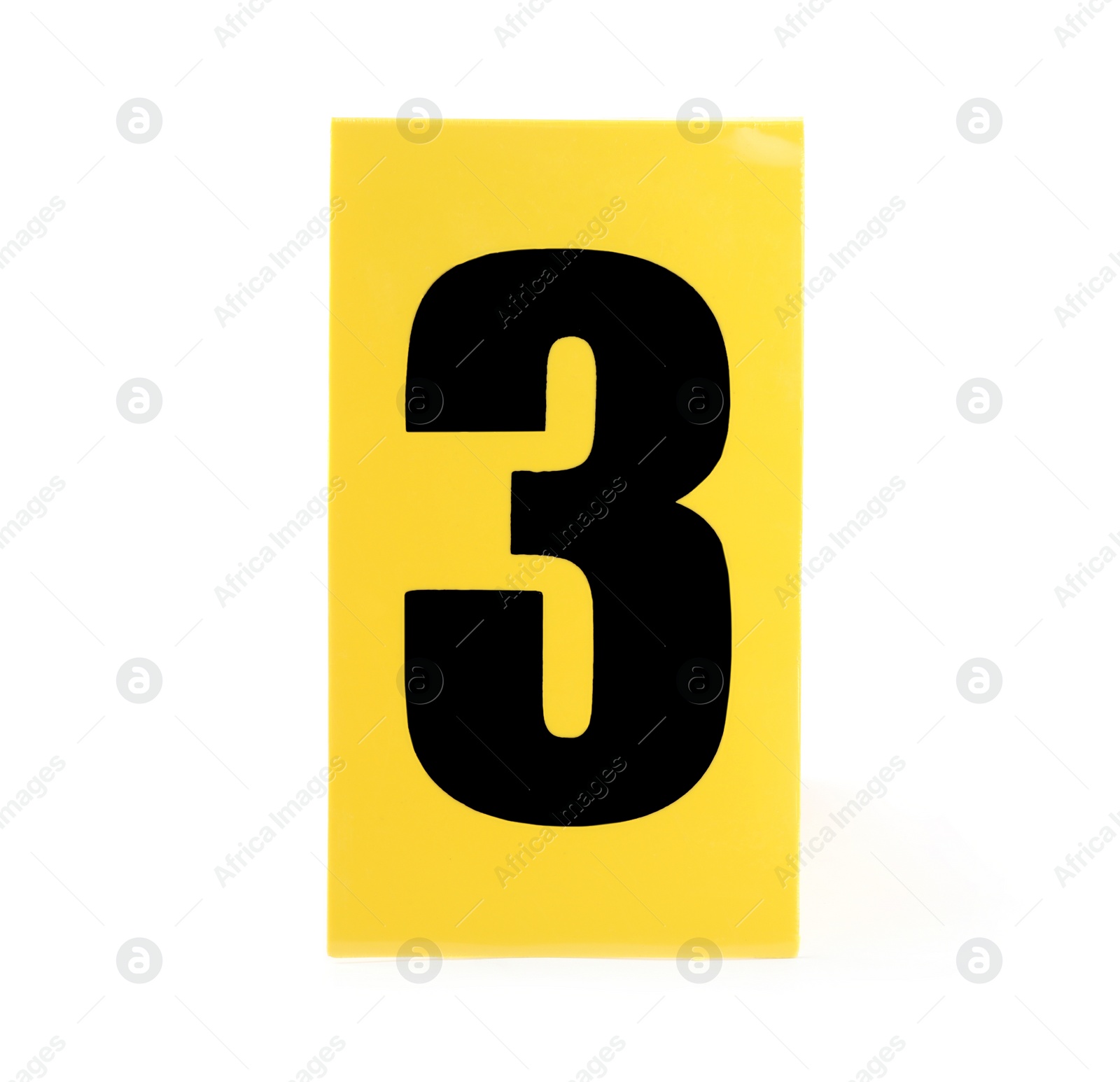 Photo of Yellow crime scene marker with number three on white background