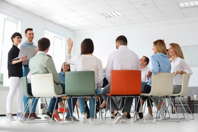 Young people having business training in office