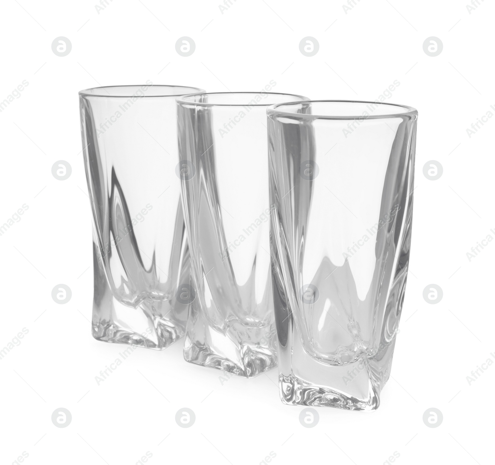 Photo of Elegant clean empty highball glasses isolated on white