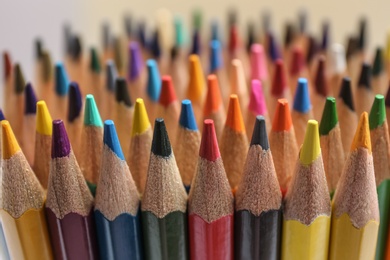 Photo of Different color pencils as background, closeup view