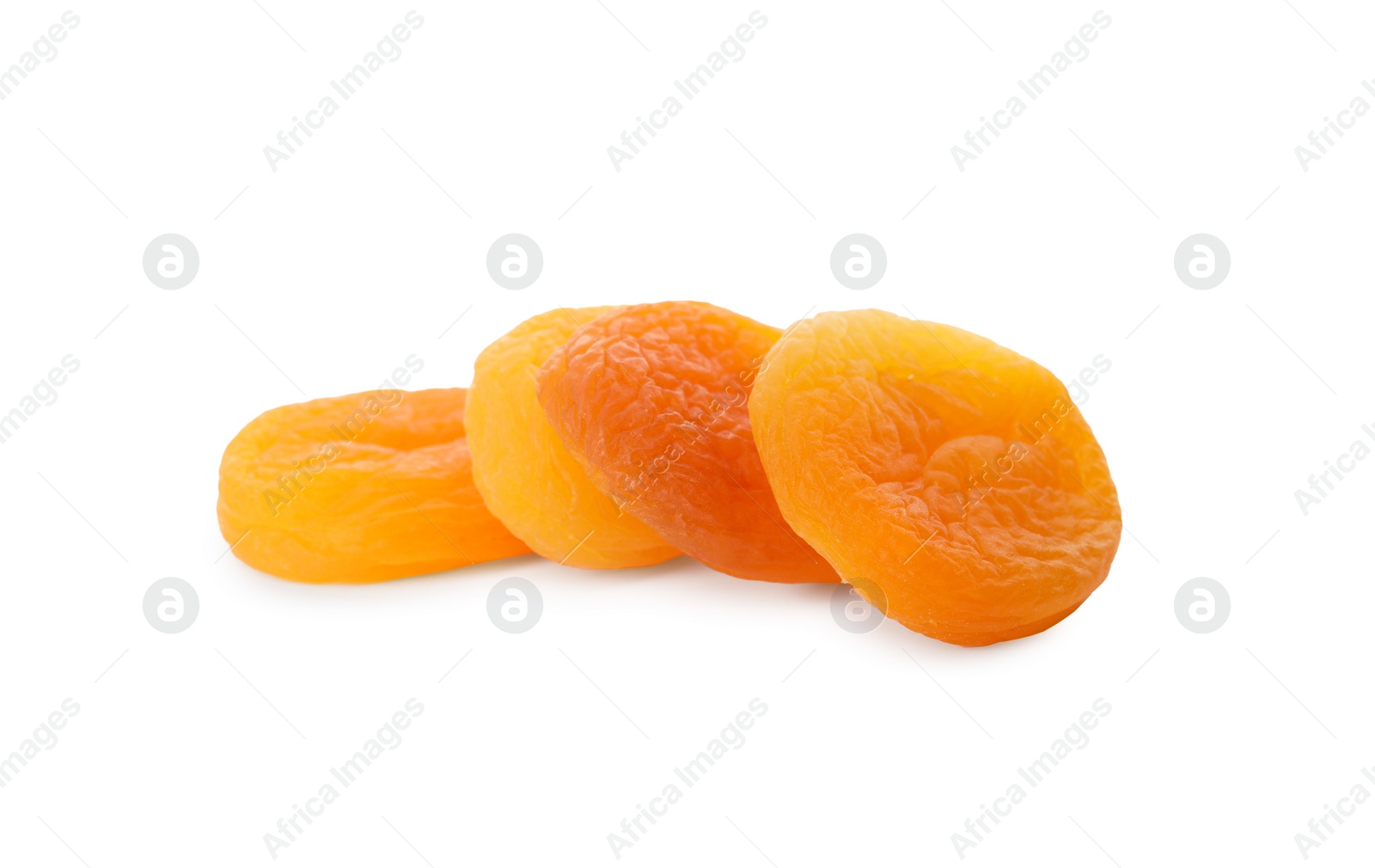 Photo of Tasty apricots on white background. Dried fruits