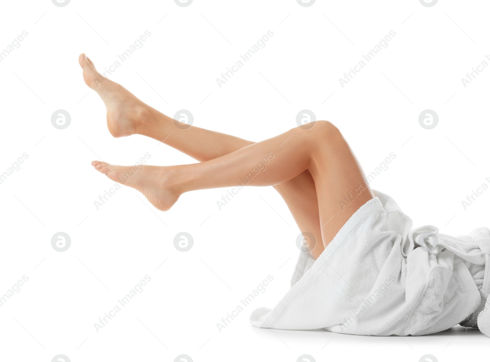 Photo of Young woman with beautiful long legs on white background, closeup