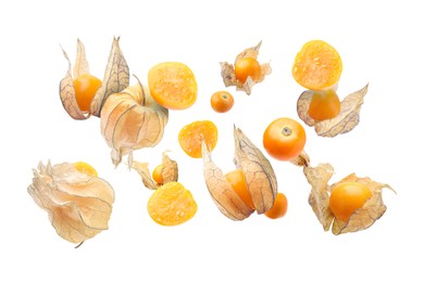 Ripe orange physalis fruits with calyx falling on white background