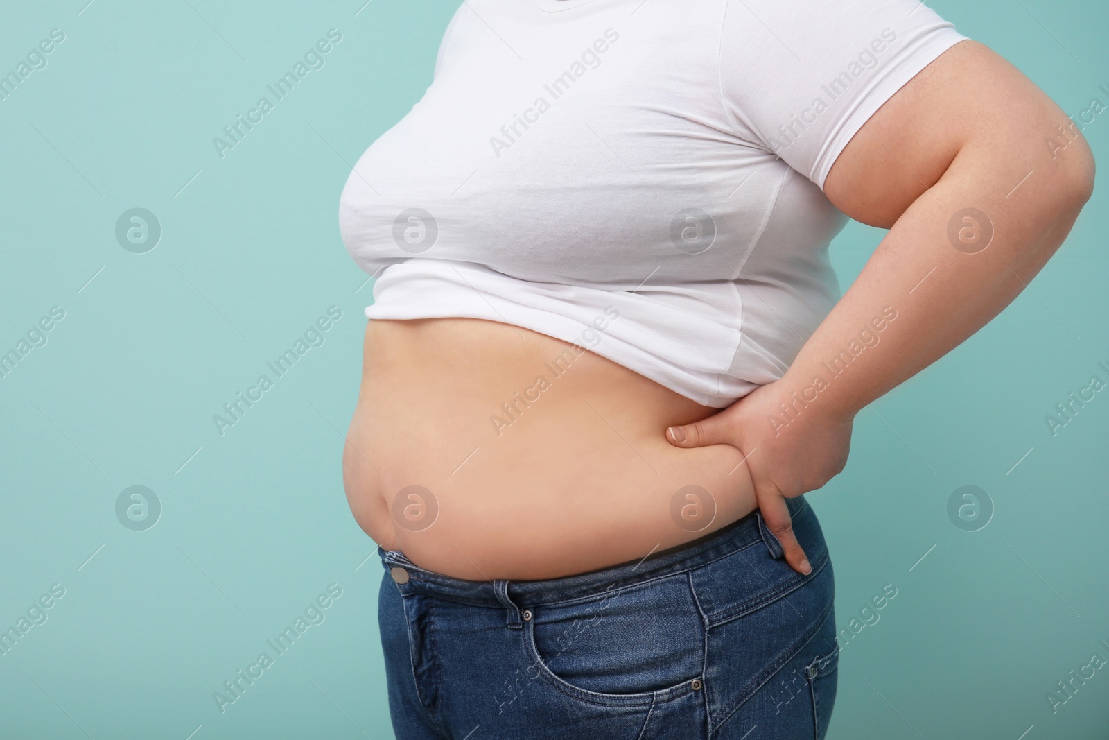 Photo of Overweight woman on color background