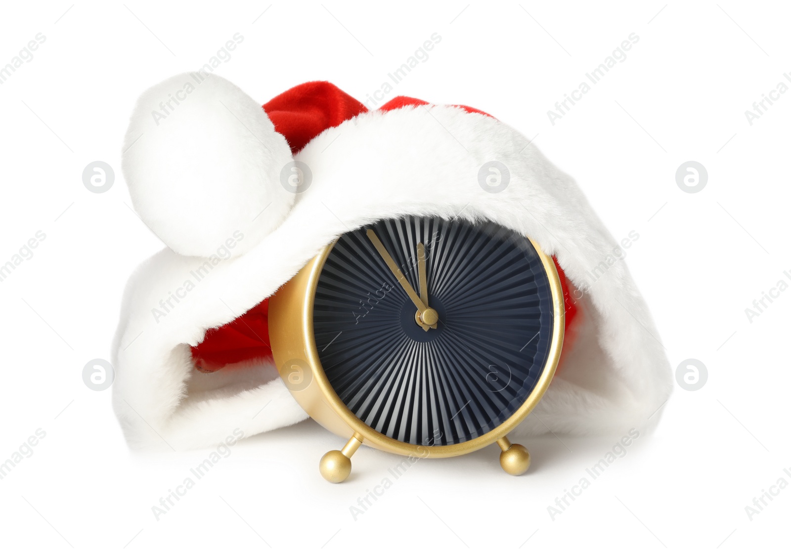 Photo of Alarm clock with Santa hat on white background. New Year countdown