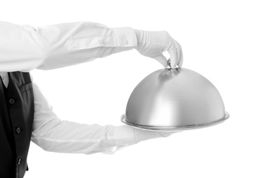 Waiter holding metal tray with lid on white background, closeup