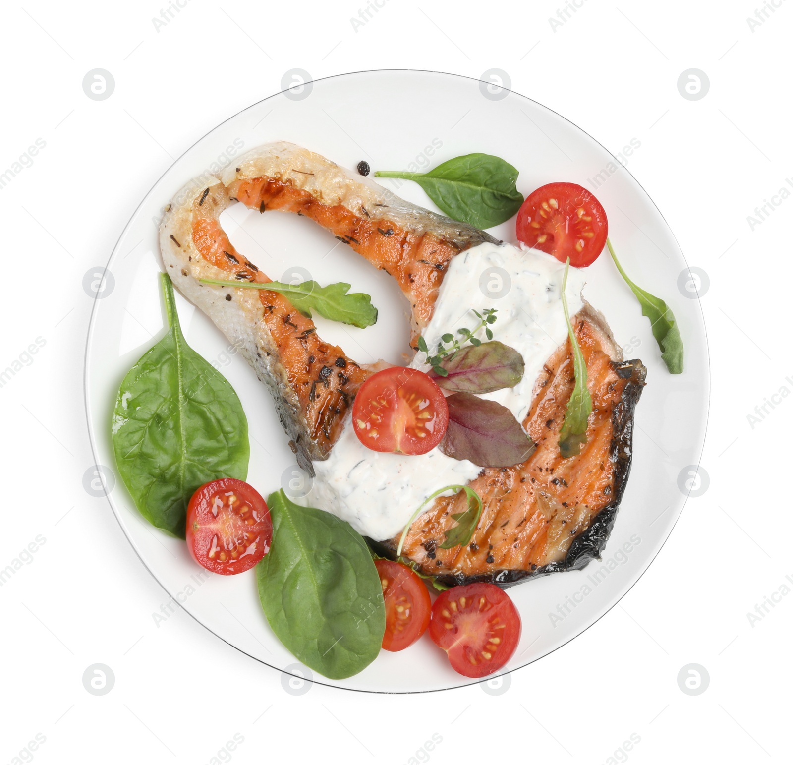 Photo of Tasty salmon steak with basil and tomatoes on white background, top view