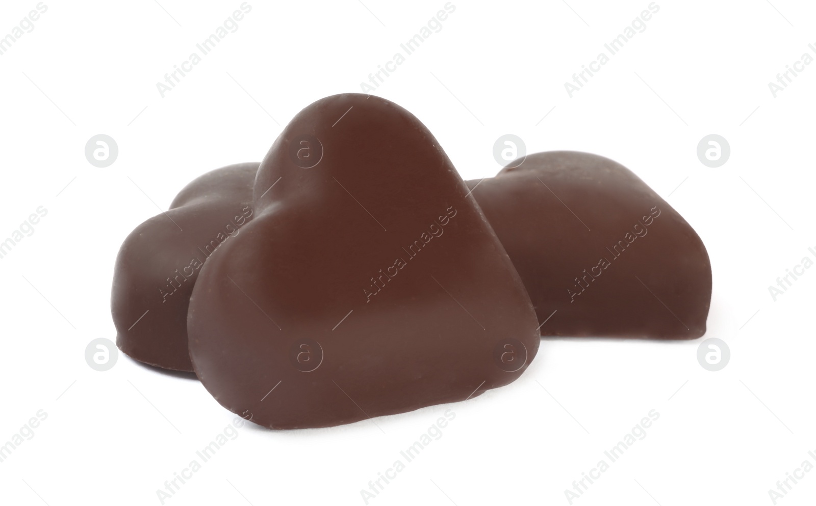 Photo of Beautiful heart shaped chocolate candies on white background