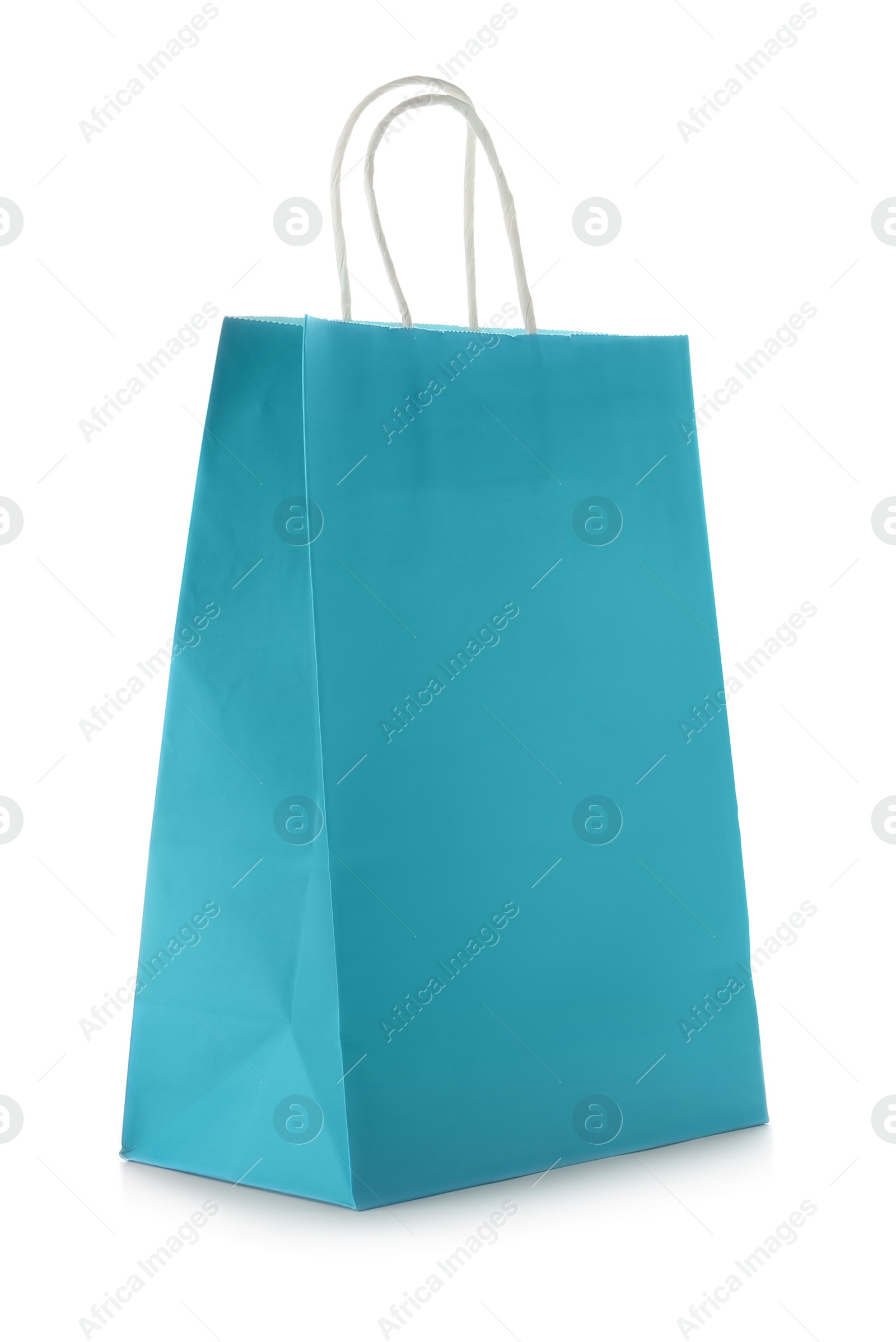 Photo of Mockup of paper shopping bag on white background