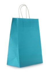 Photo of Mockup of paper shopping bag on white background