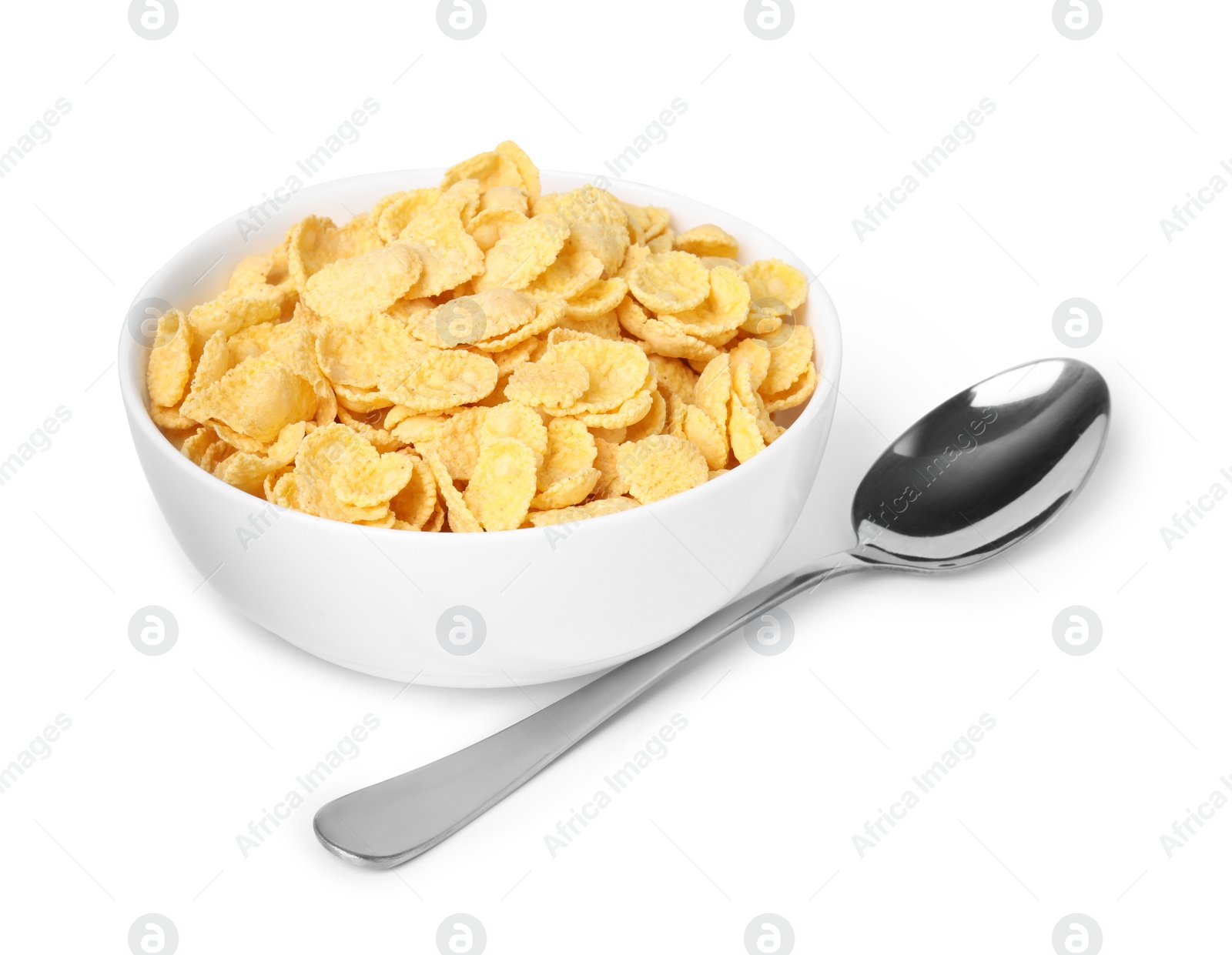 Photo of Breakfast cereal. Tasty corn flakes in bowl and spoon isolated on white