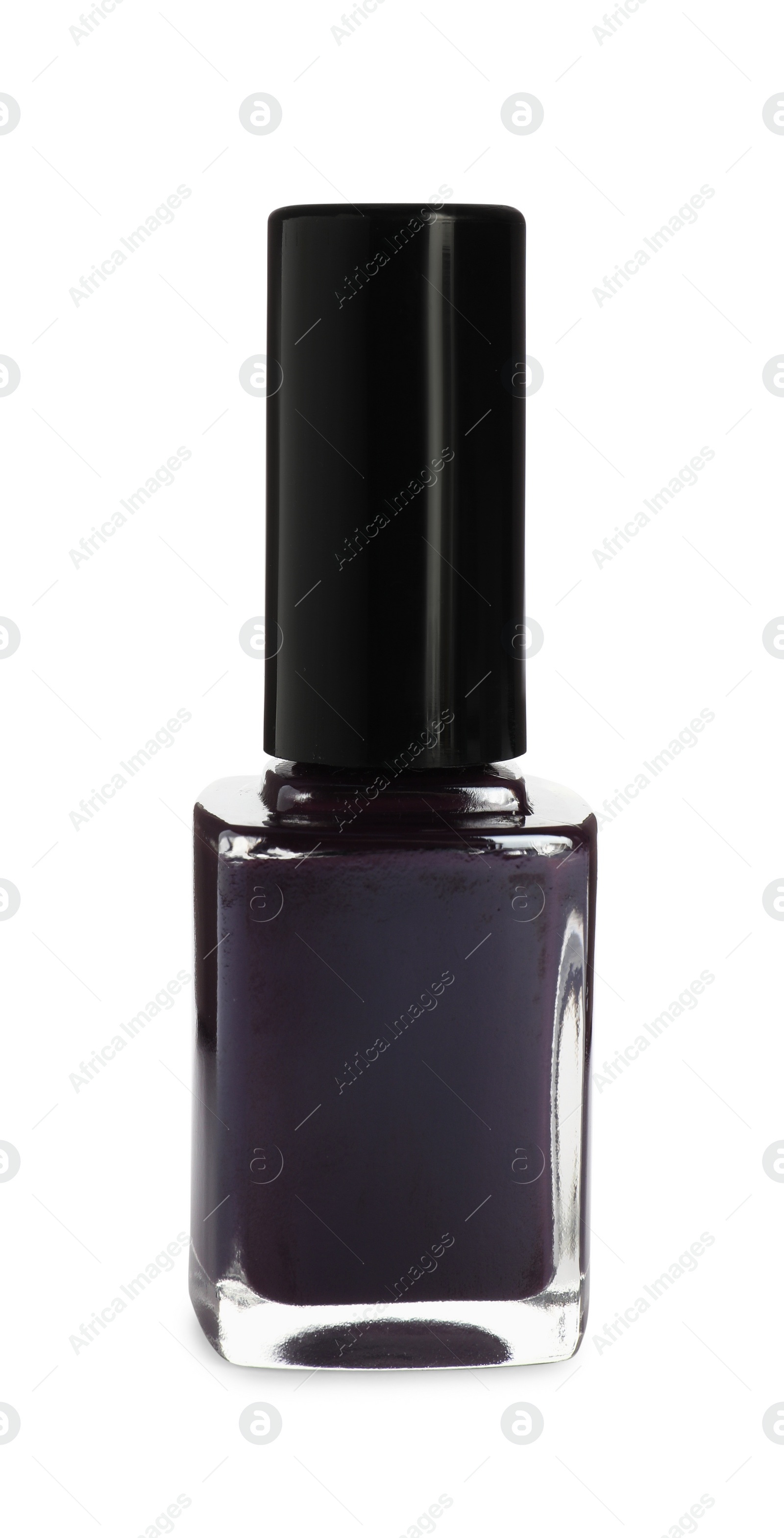 Photo of Purple nail polish in bottle isolated on white