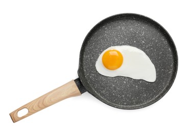 Tasty cooked chicken egg in frying pan isolated on white, top view