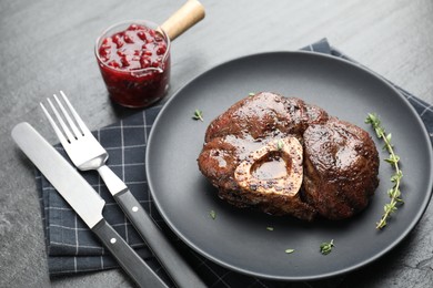 Delicious roasted beef meat served on black table