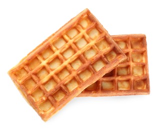 Photo of Delicious Belgian waffles on white background, top view