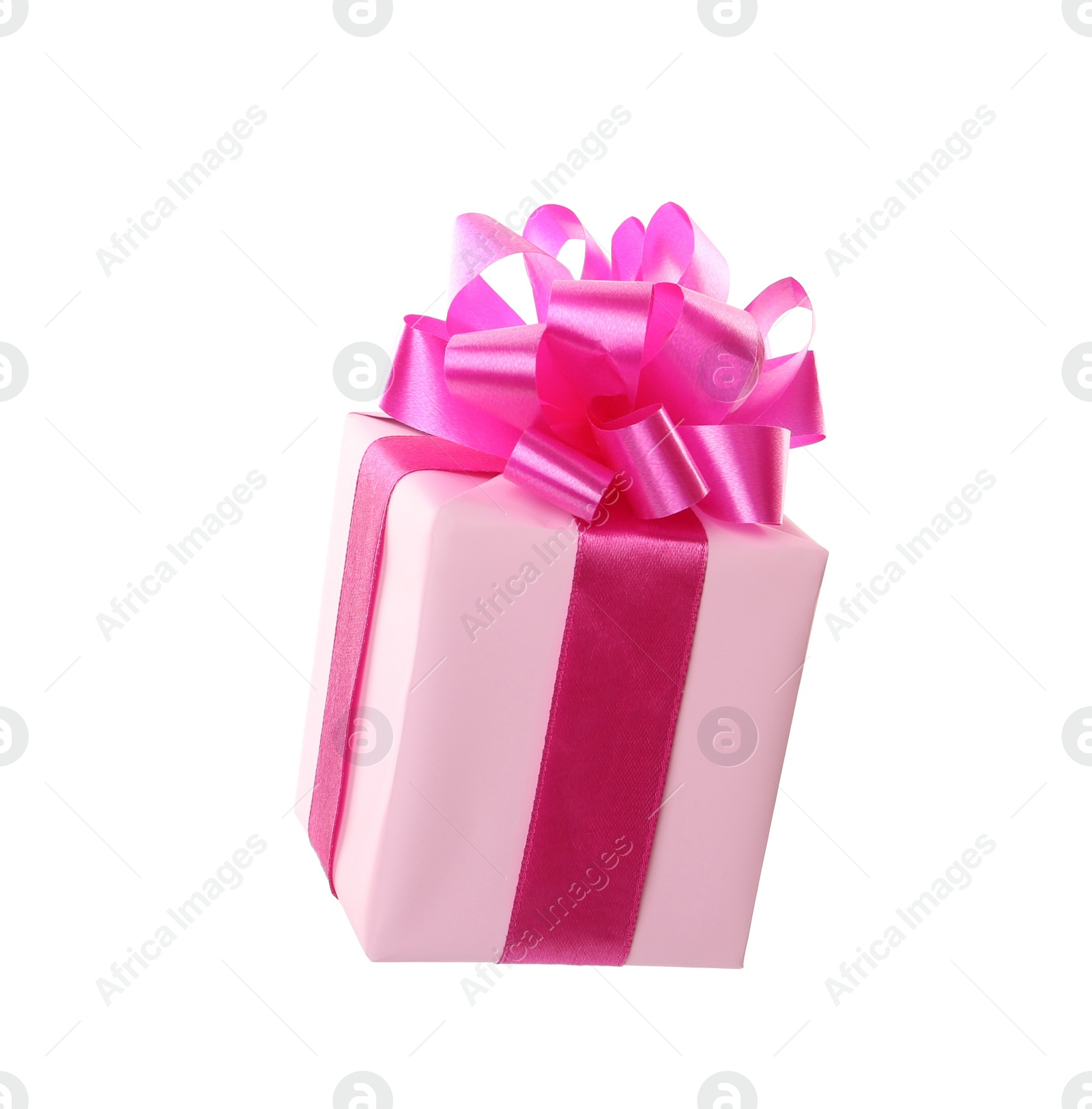 Photo of Light pink gift box with bow isolated on white