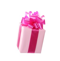 Photo of Light pink gift box with bow isolated on white