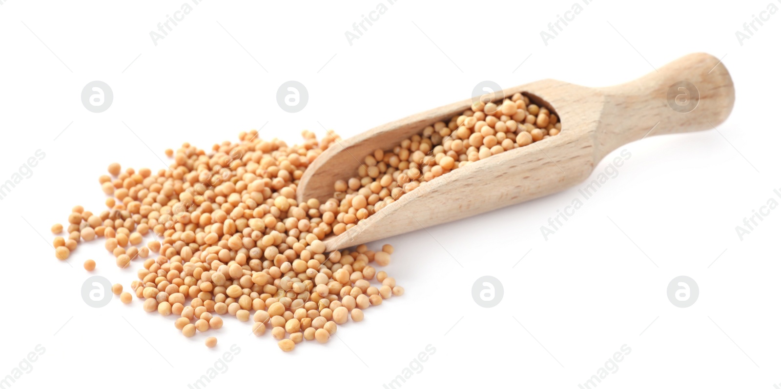 Photo of Mustard seeds with wooden scoop isolated on white