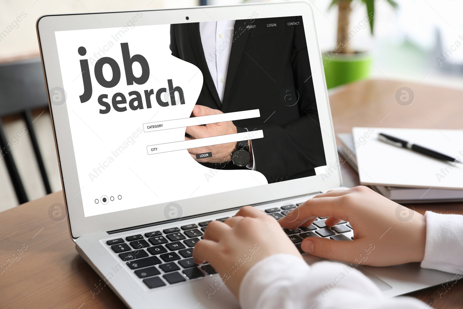 Image of Woman searching job with laptop at wooden table, closeup 