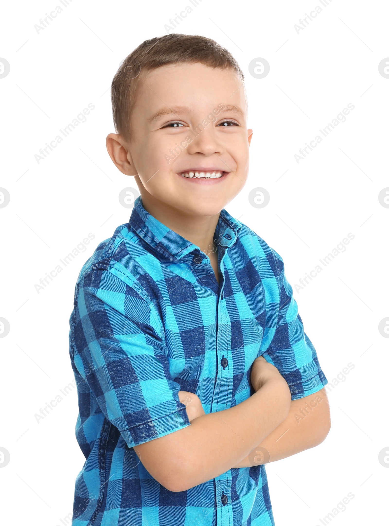 Photo of Portrait of cute little boy on white background