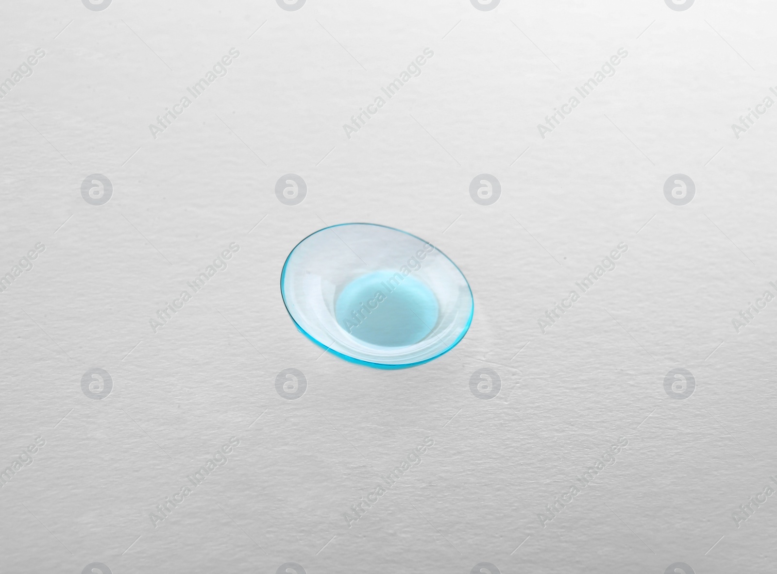 Photo of Contact lens on light background