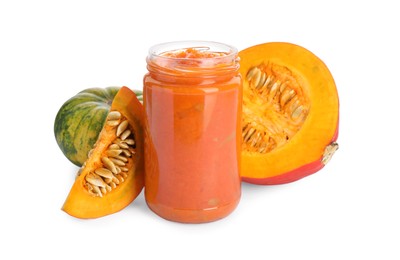 Photo of Jar of pumpkin jam and fresh pumpkins on white background