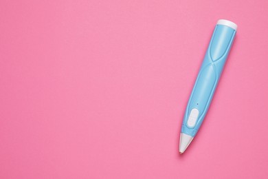 Photo of Stylish 3D pen on pink background, top view. Space for text