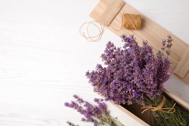 Flat lay composition with lavender flowers on light background