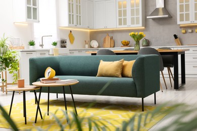 Spring atmosphere. Stylish living room interior with comfortable furniture