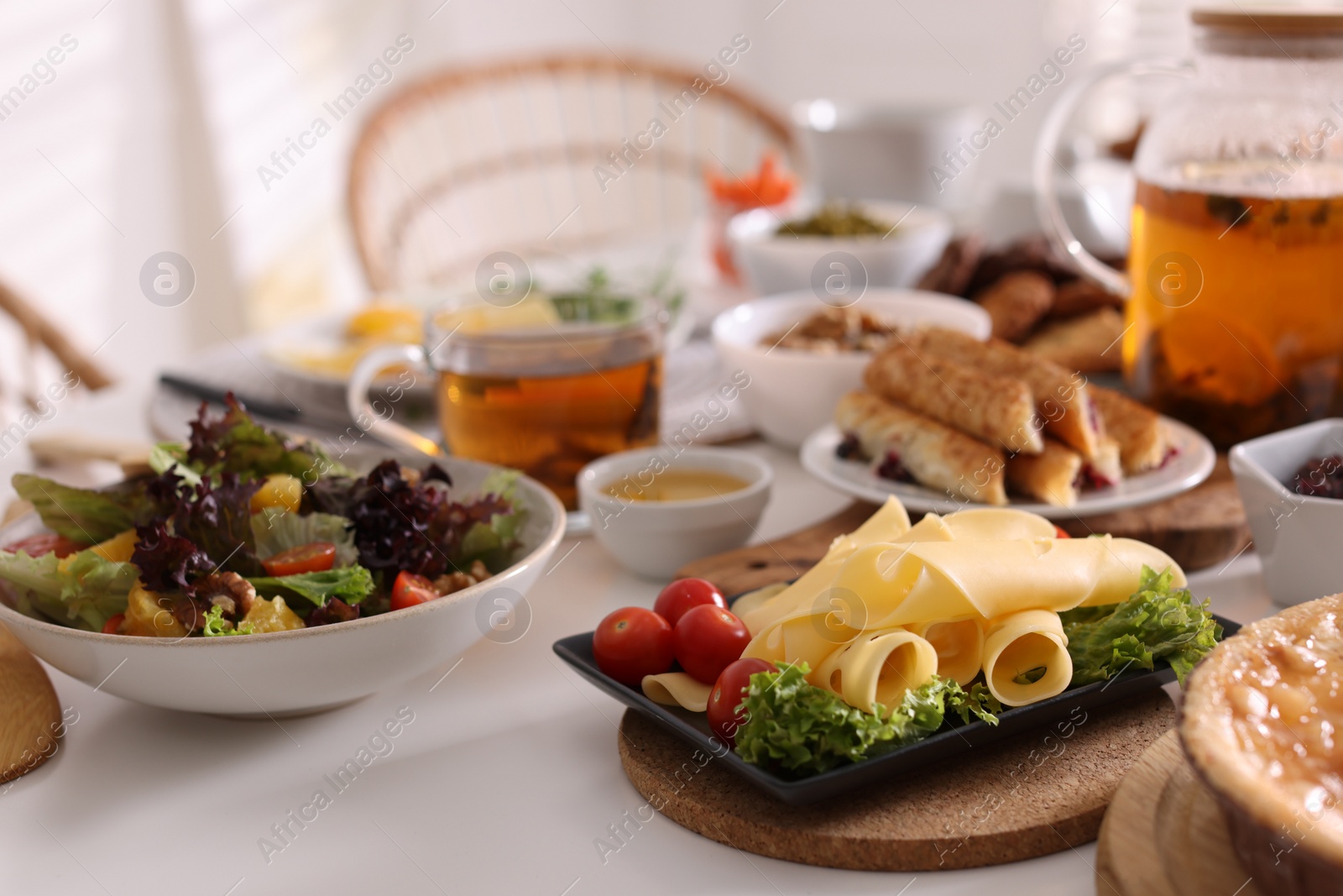 Photo of Many different dishes served on buffet table for brunch