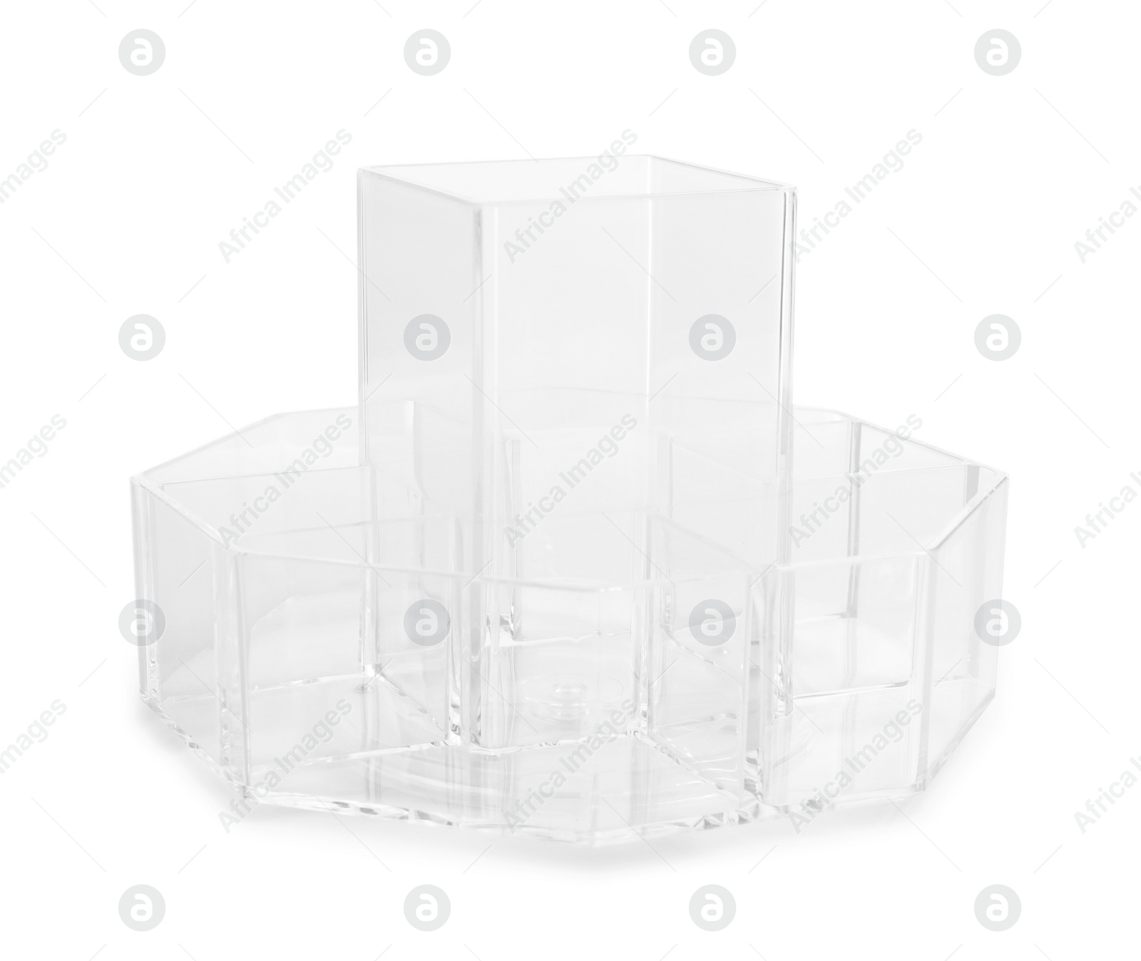 Photo of Empty lipstick holder on white background. Makeup organizer