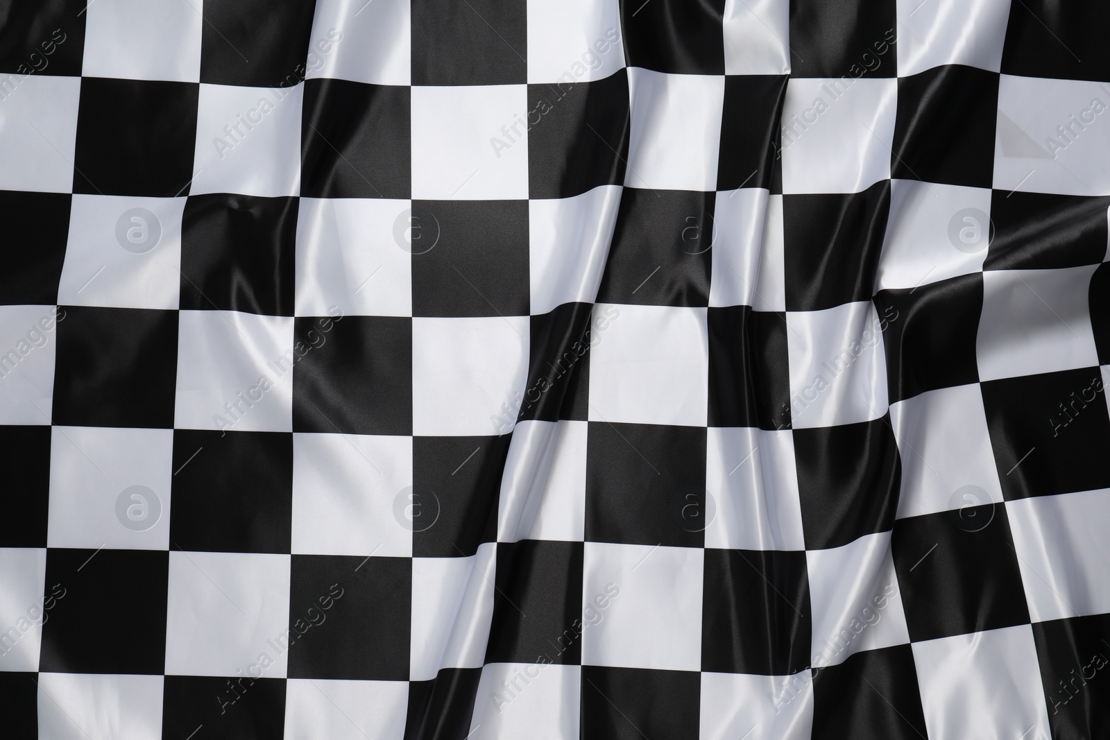 Photo of Checkered satin fabric as background, closeup view