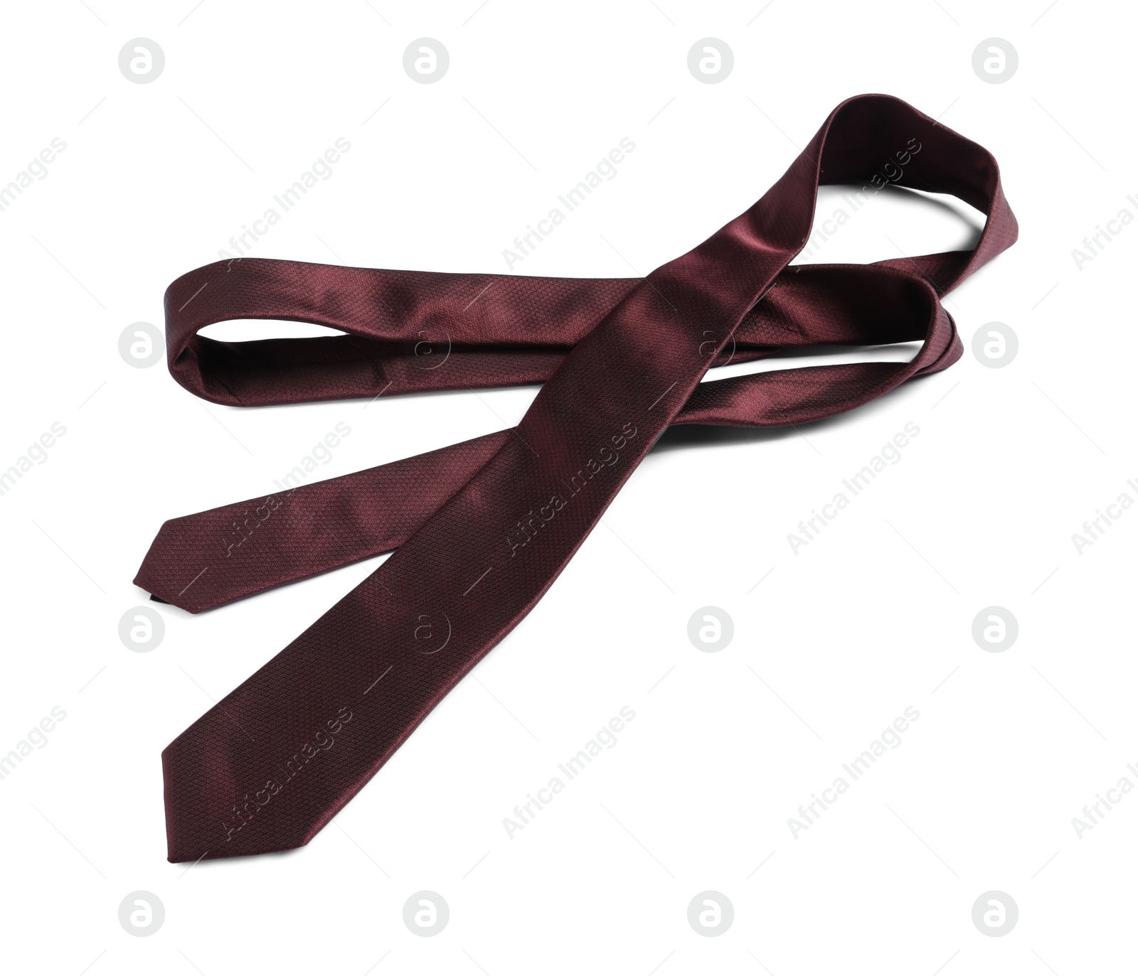 Photo of One brown necktie isolated on white, above view