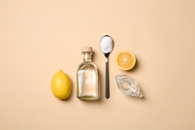 Photo of Flat lay composition with vinegar on color background