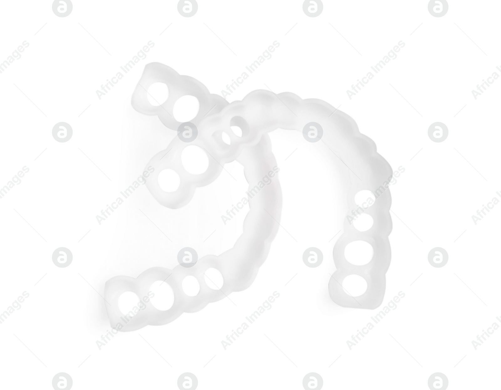 Photo of Dental mouth guards on white background, top view. Bite correction